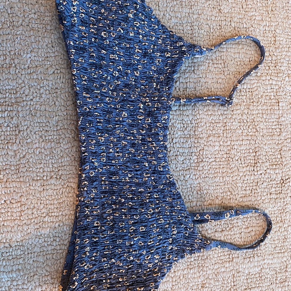 blue swim suit top with flowers from cotton on